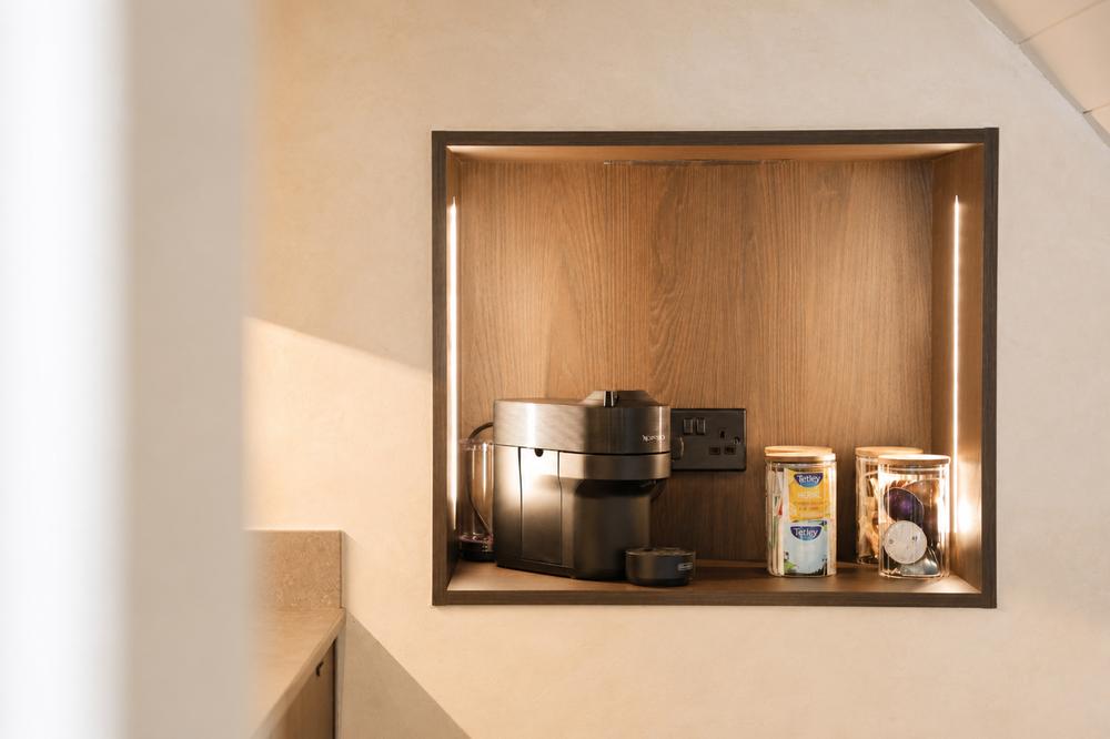 Close-up of the Nespresso machine and tea and coffee station