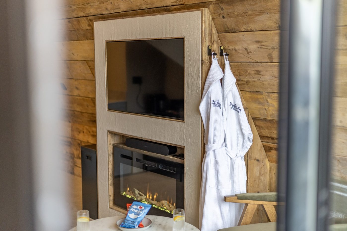 Pantcefn branded robes and electric fireplace inside the Tri-Pod